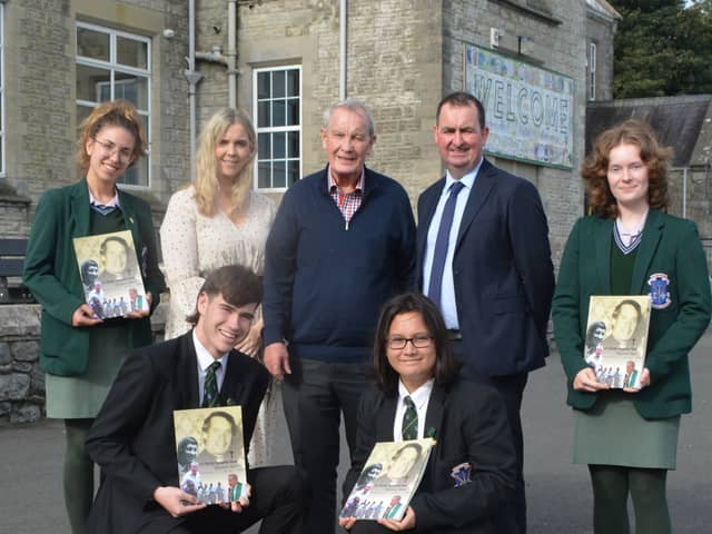 Back L-R: Gabriella Handzhieva, Sarah Jayne Morris (Head of Religion), Father Nicky Hennity, Mr Kevin Martin (St. Louis Principal) and Grainne Rooney. Front L-R Dominykas Daksevic and Rian Young.
