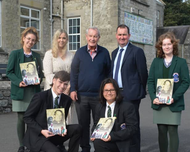 Back L-R: Gabriella Handzhieva, Sarah Jayne Morris (Head of Religion), Father Nicky Hennity, Mr Kevin Martin (St. Louis Principal) and Grainne Rooney. Front L-R Dominykas Daksevic and Rian Young.