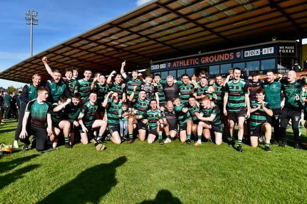Killeavy players celebrate after they defeated Sean Treacy's 2-17 to 2-12 in the Armagh Junior Hurling Championship Final.