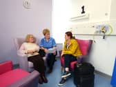 Staff Nurse Bernadette Cunningham with patient Margaret Savage, ready to go home with her daughter Richella Byrne.