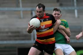 Cullyhanna’s Pearse Casey breaks clear of Pearse Og’s Paul Duffy during the Intermediate Championship Semi-final.