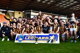 Crossmaglen Rangers celebrate after defeating Clan na Gael to win their 47th Armagh county title.