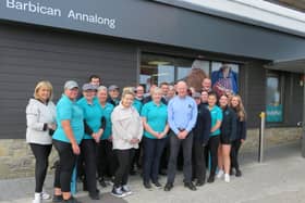 Simon Heenan is pictured with the local team from SPAR Barbican, Annalong. The business has been acquired by Henderson Retail, with all 42 staff remaining within their roles in-store.