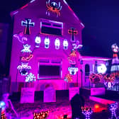 The house in Bristol is covered with around 8,000 lights to raise money for charity at Halloween