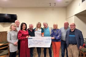 The Mountain House Tractor Run Fundraising Committee handing over a cheque for the proceeds of their Tractor Run to Kidney Care UK Northern Ireland Ambassador Jo-Anne Dobson.