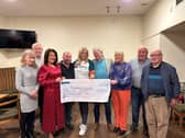 The Mountain House Tractor Run Fundraising Committee handing over a cheque for the proceeds of their Tractor Run to Kidney Care UK Northern Ireland Ambassador Jo-Anne Dobson.