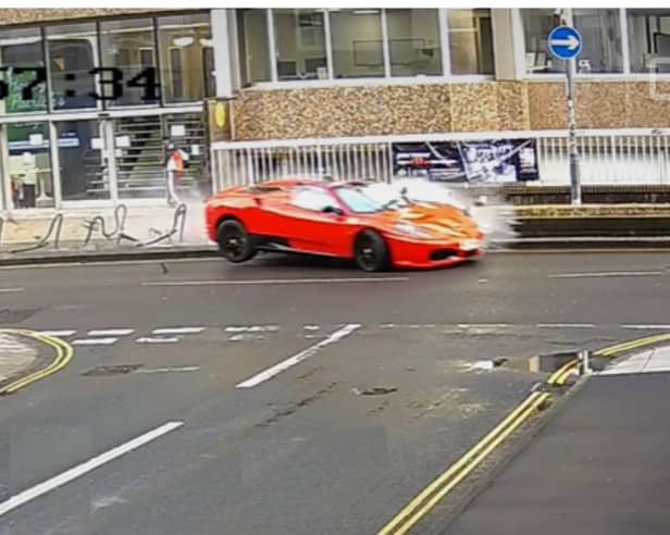 CCTV captures moment driver crashes £100k Ferrari in city centre