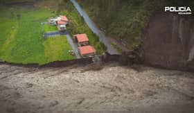 Waves of mud crash through tourist city as landslide kills 6.