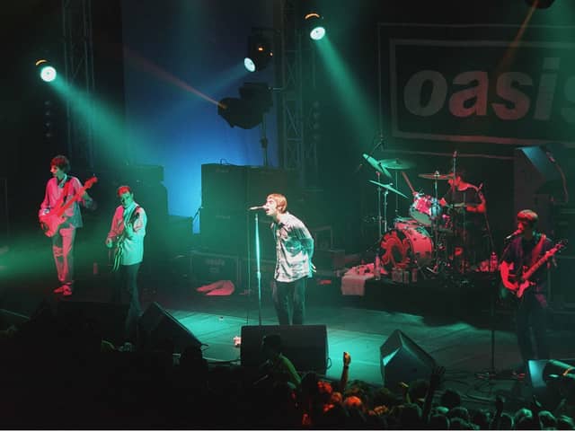 Liam and Noel Gallagher are to go on tour as Oasis again (Photo by Brian Rasic/Getty Images)