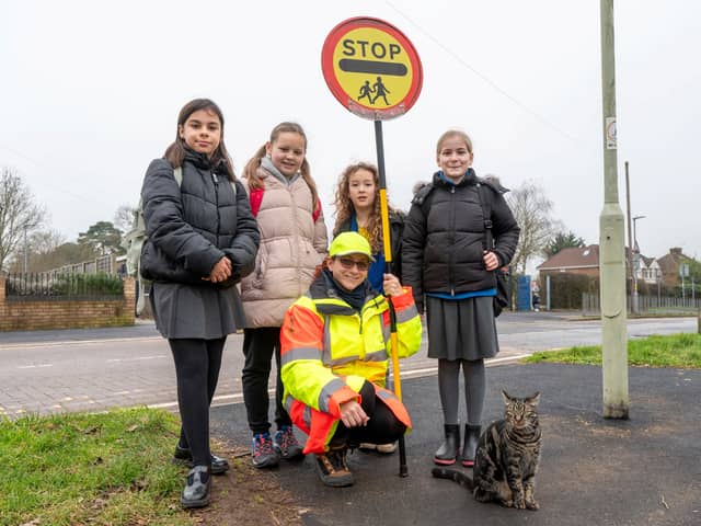 From the left - Elena Michalczuk, 11, Grace Pratt, 10, Cordelia Donald, 9, Amy Brooks, 11, with Klara Remmington and Bandit the cat.