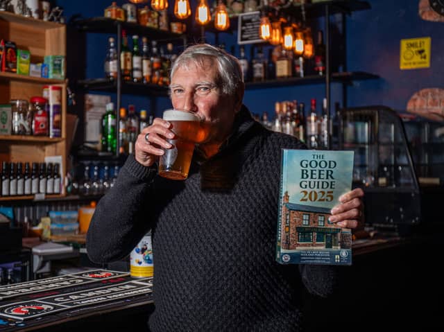 Rob Cocker, from Stoke-on-trent, with his good beer guide in his local pub Manor Court Ale House enjoying a pint of beer to add to his list. So far he has visited over 12,000 pubs in 55 years. Photo: William Lailey / SWNS