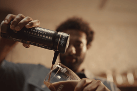 The Guinness Nitrosurge device helps you pour the perfect pint at home