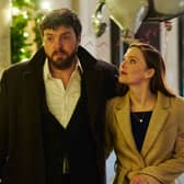 Tom Burke (L) and Holliday Grainger (R) in BBC's Strike.