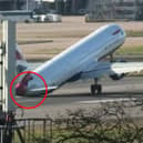 Tail of British Airways jet hits runway during aborted landing.