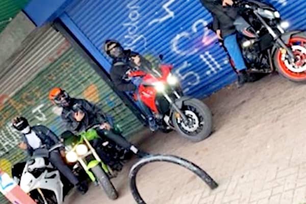 The gang filmed and pictured themselves driving stolen cars and motorbikes. 