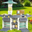The Dolu play kitchen is durable enough to be used in the garden 