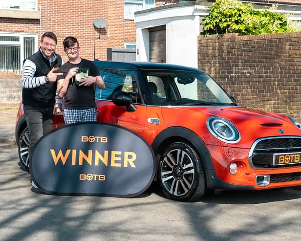 Andrew Heal woke up to see a familiar face at the door - and then he was given a massive prize