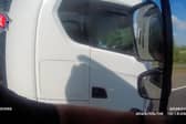 Lorry driver caught rolling cigarette with no hands on wheel