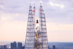 Superman soars above London in a spectacular display at the highest point of The Shard