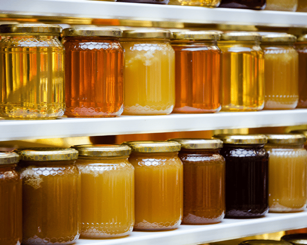 A wide range of honey jars on UK shelves – but nearly half could be adulterated with sugar syrup, according to EU tests