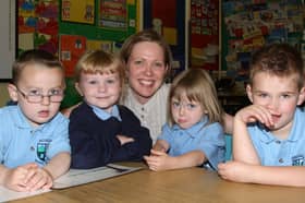 Teacher Diane Fleming with new P1 pupils Alan Boyd, Naomi Wilson, Samantha Hamill and Tyler Heigh, at Groggan Primary School, Antrim, in 2007