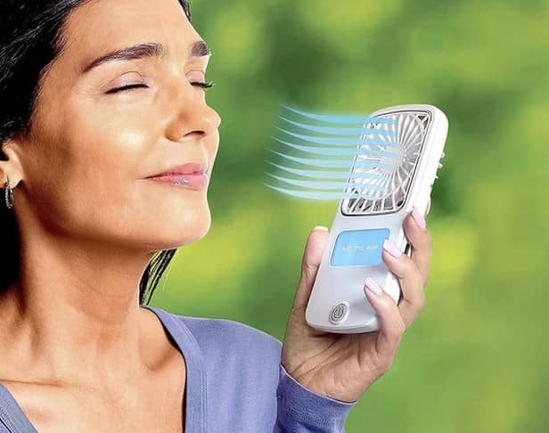 The fan's built-in water tank creates an evaporative effect to blast you with a cold mist
