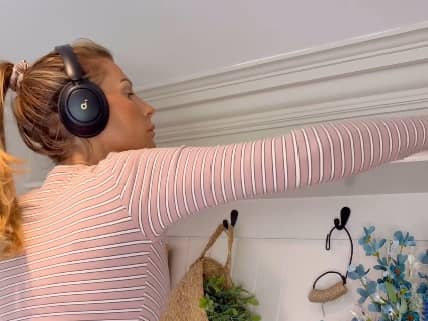 Mrs Hinch uses the soundcore Q30 by Anker Hybrid Active Noise Cancelling Headphones to keep her entertained while she does the cleaning.