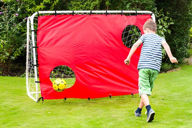 The included target sheet helps children develop shooting accuracy and football skills while adding an extra challenge to garden practice sessions.