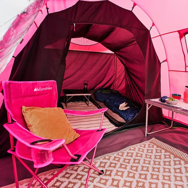 This spacious four-person tent and folding chair made my first night camping feel much more comfortable.
