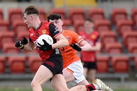 Caolan Flanagan drives his way past Armagh's Jarlath O'Neill when the Minor sides played in March.