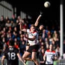 Pat Havern flicks on a high ball during Down's National League clash with Louth at Drogheda. Picture: Brendan Monaghan BM14.jpg