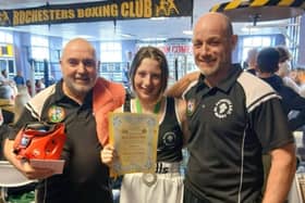Gold medal winner Amy McManus pictured with her coaches.