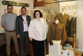 Newry, Mourne and Down District Council Chairperson, Councillor Pete Byrne with Alan Freeburn, Museum and Heritage Services Manager and Joanne Cummins, Collections Officer attending the launch of a new exhibition at Newry, Mourne and Down Museum to mark the 80th Anniversary of the D-Day landings.
