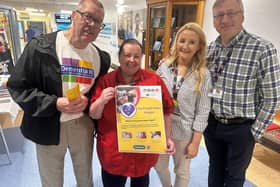 Craigavon Area Hospital ED Sister Shauna Colyer and Naoimh McGlone Service Improvement Lead for Dementia are pictured launching the Purple Heart Project with Gerard Doran and Peter Alexander, Dementia NI members who were part of the ED Quality Improvement group who developed the Purple Heart Patient leaflet.