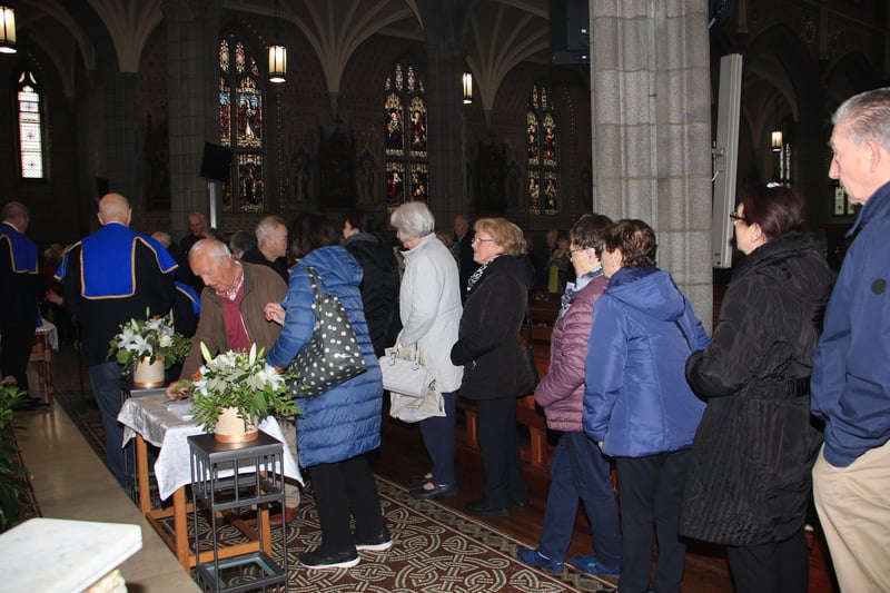 The queue to pray at the Relic of Venerable Matt Talbot and also to sign the Book of Condolence in memory of Pope Francis in Newry Cathedral on Friday 25th April 2025. INNR1705
