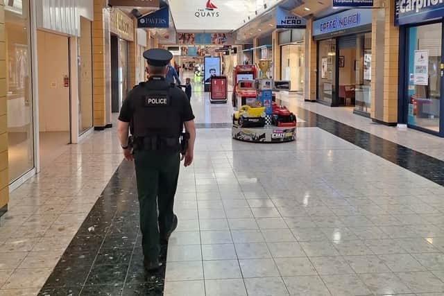 A PSNI officer on patrol in The Quays, Newry.