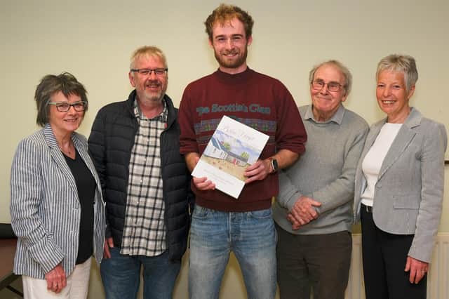 Launching the 18th edition of Before I Forget journal in Poyntzpass are members of Poyntzpass and District Historical Society. Included from left are Helena Gamble, Mark Skillen, Graphic Designer; Robert Morrow, Chairman; Frank Watters and Barbara Best. Photograph: Columba O'Hare/ Newry.ie