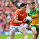 Armagh’s Rory Grugan goes on the attack against Donegal’s Peadar Mogan. Pic: John Merry