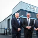 Alan McKeown, Executive Director of Business Growth, Invest NI, Economy Minister Conor Murphy and Pádraig Mallon, Chief Executive Officer, Pure Engineering Group.