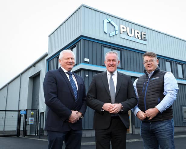 Alan McKeown, Executive Director of Business Growth, Invest NI, Economy Minister Conor Murphy and Pádraig Mallon, Chief Executive Officer, Pure Engineering Group.