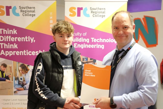 Josh Doran, runner-up in the Plumbing Wall & Floor Tiling SRC SkillBuild Competition.  Josh is pictured alongside Curriculum Area Manager Gareth Mone.