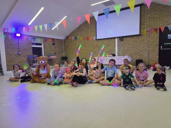 Children enjoying the festivities at Carnagat Community House.