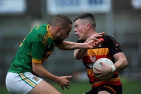 Cullyhanna’s Aidan Nugent (right) kicked the winning point against Pomeroy.