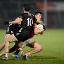 Down pair Tom Close and James Guinness in action against Armagh in the last round of the McKenna Cup at the Athletic Grounds. Picture: Brendan Monaghan BM01