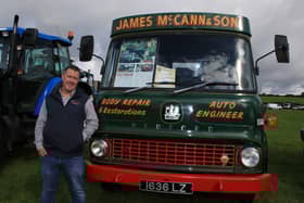 James McCann stands proudly at the 1966 TK Bedford van that he and his father restored. INNR4028
