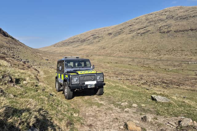 A police 4x4 in the Mournes.