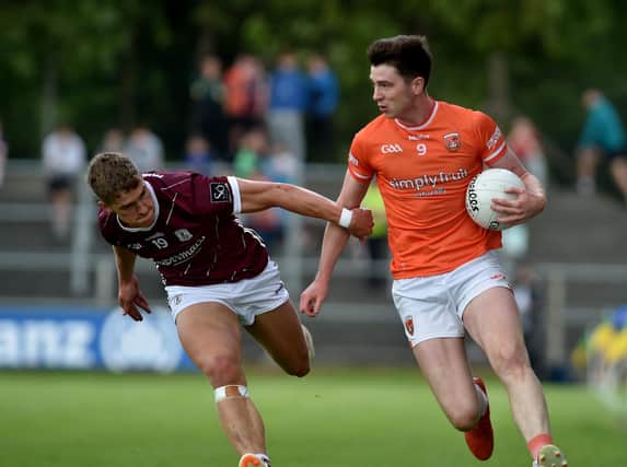 Armagh’s Ben Crealey looks to get past Galway’s Billy Mannion during their meeting in 2023.