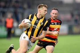 Crossmaglen's Rian O'Neill powers past Cullyhanna's Kieran McCooey during their quarter-final meeting. Pic: Brendan Monaghan