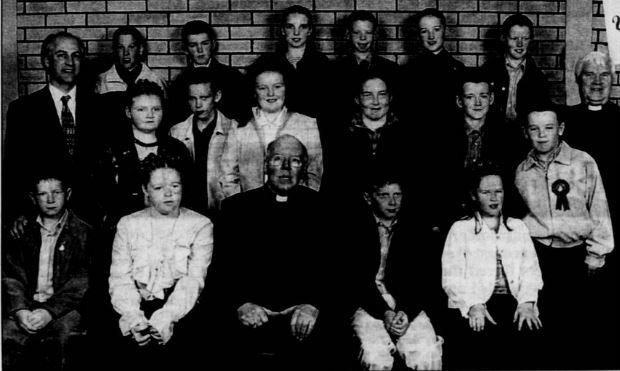 Pupils from Barr Primary School pictured after their confirmation with Most Rev John McAreavey, Bishop of Dromore, Fr Jarleth Cushenan PP and school principal Mr William MacLennan.