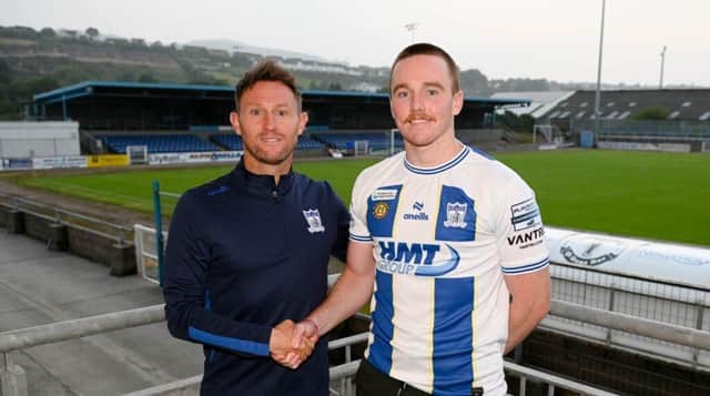Newry's newest signing Kane Rossiter (right) pictured with Assistant Manager Ryan Moffatt.